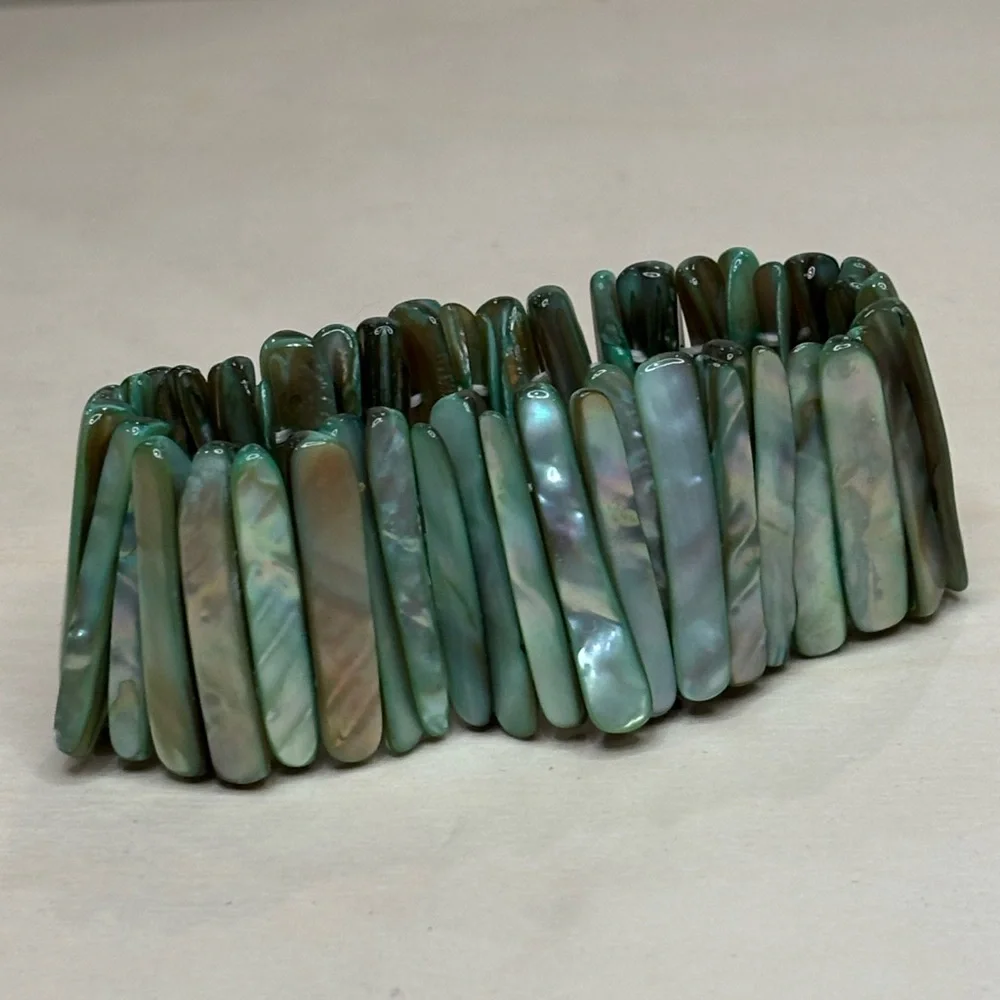 Mother of Pearl Abalone Shell light green shades panel stretch bracelet.